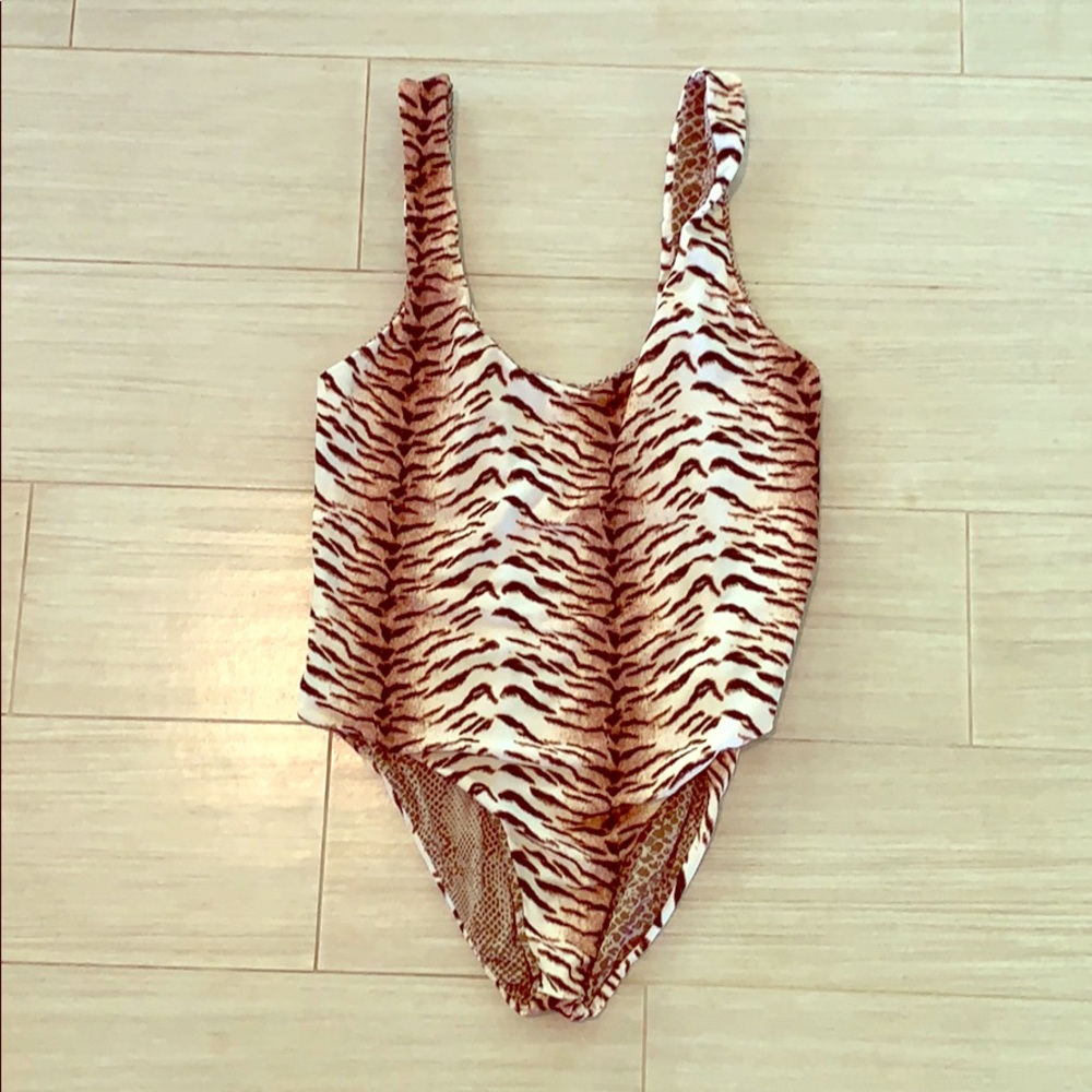 Acacia Tiger strip reversible one piece.